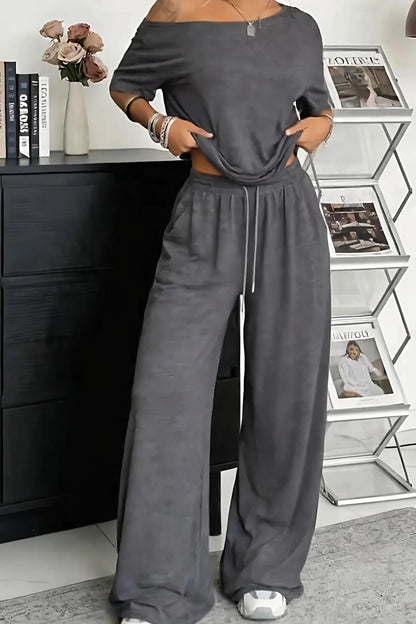 【S-5XL】Conjunto 2026: Camiseta elegante de manga corta con hombros descubiertos + Pantalones holgados con cordón y zapatos anchos 😍 ¡Imprescindible para el verano!