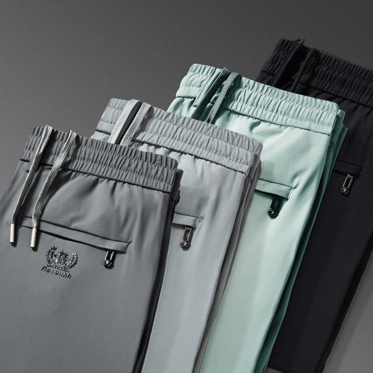 💥🧊😍【M-5XL】Pantalones finos de seda helada para hombre, ideales para el verano. El tejido es suave, cómodo, transpirable y de secado rápido.