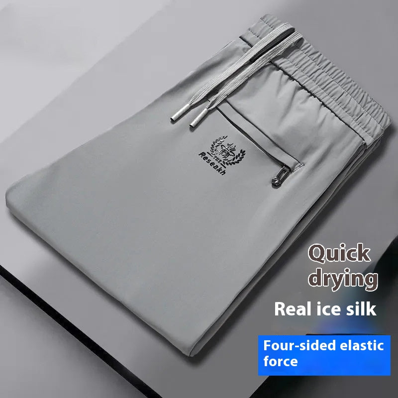 💥🧊😍【M-5XL】Pantalones finos de seda helada para hombre, ideales para el verano. El tejido es suave, cómodo, transpirable y de secado rápido.