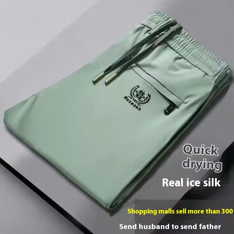💥🧊😍【M-5XL】Pantalones finos de seda helada para hombre, ideales para el verano. El tejido es suave, cómodo, transpirable y de secado rápido.