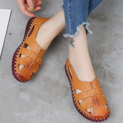 Sandalias planas de piel suave para mujer