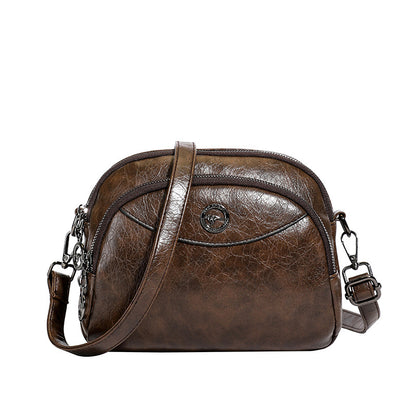 👜Bolso de mano compacto de piel con múltiples compartimentos, modelo 2026.
